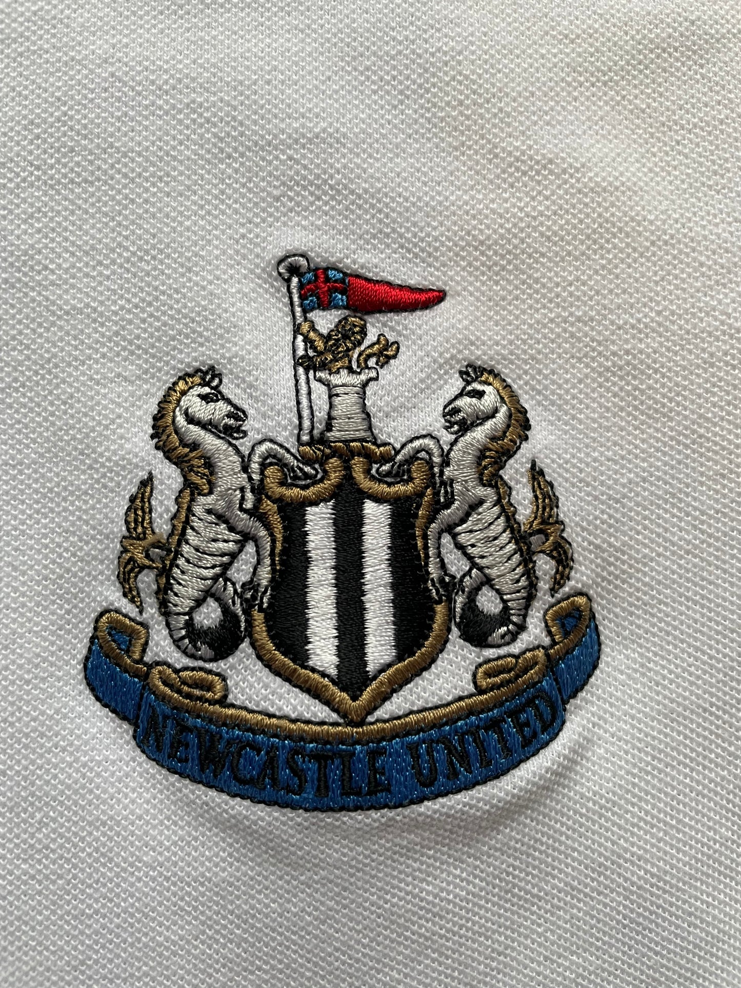 Newcastle Castore Polo Shirt (very good) Adults Medium