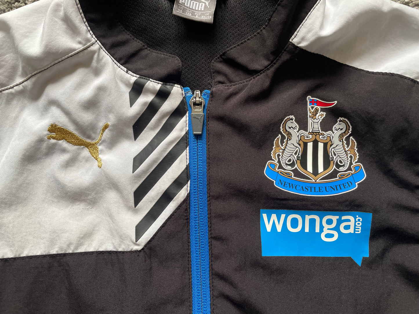 Newcastle Raincoat 2014-15 (very good) Small Youths 24/28 128