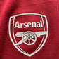 Arsenal Training Top (good) Youths 10-11 years though fits like Adults XS