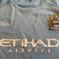 Manchester City 2010 Home Shirt (good) Childs size 134. Age 10 years. Height 17.5 inches