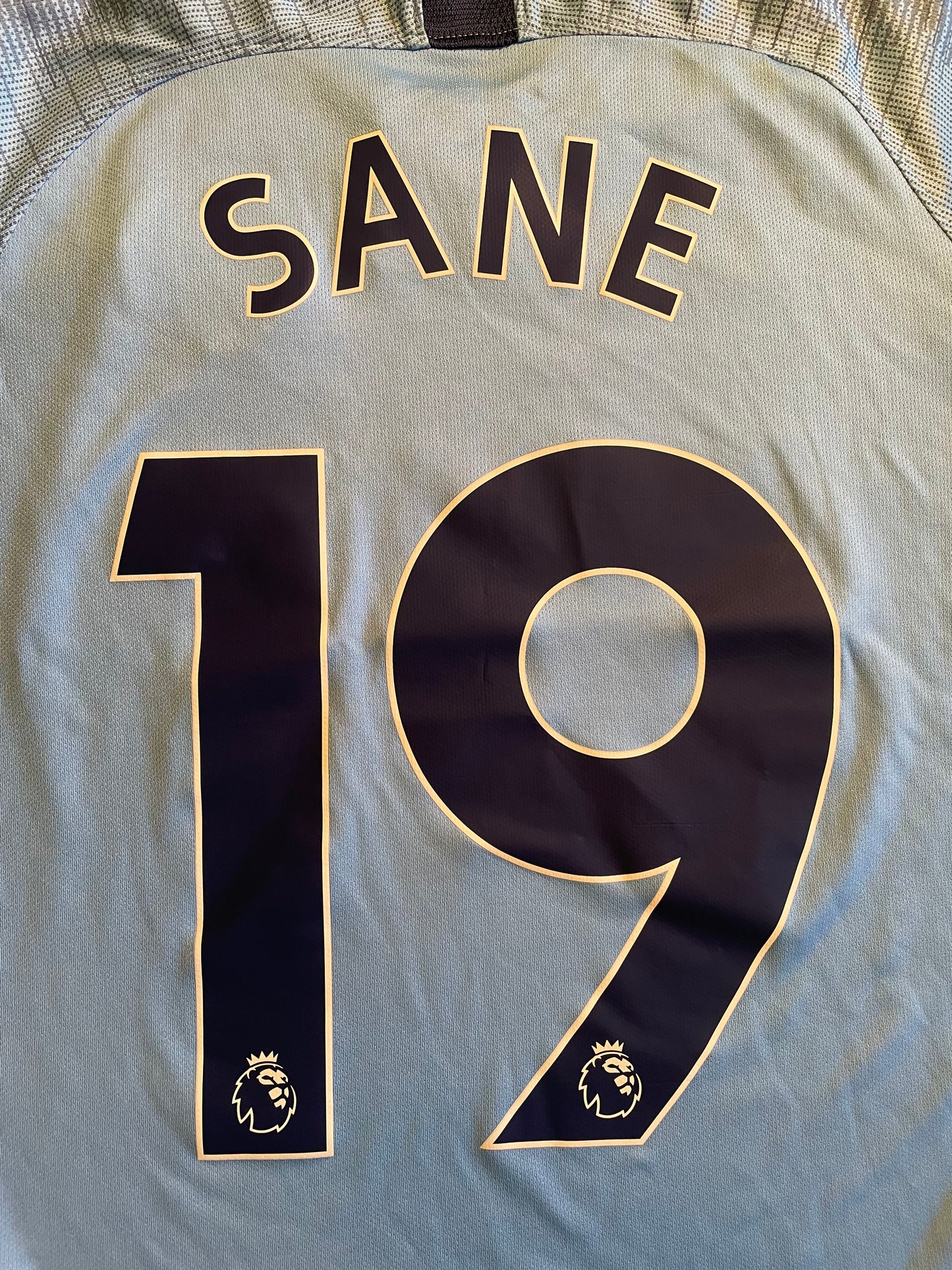 Manchester City Home Shirt 2018 -19 SANE 19 (excellent) Age 12 to 13. Height 19 inches