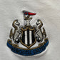 Newcastle Castore Polo Shirt (very good) Adults Medium
