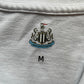 Newcastle Castore Polo Shirt (very good) Adults Medium
